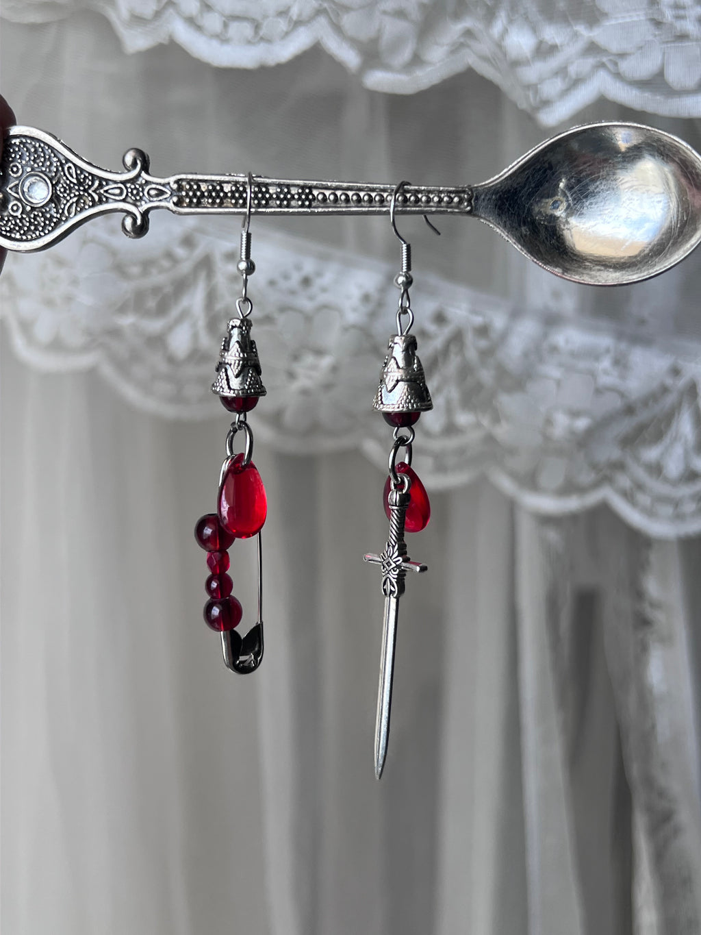 The knight earrings 🩸⋆.° 𖤉