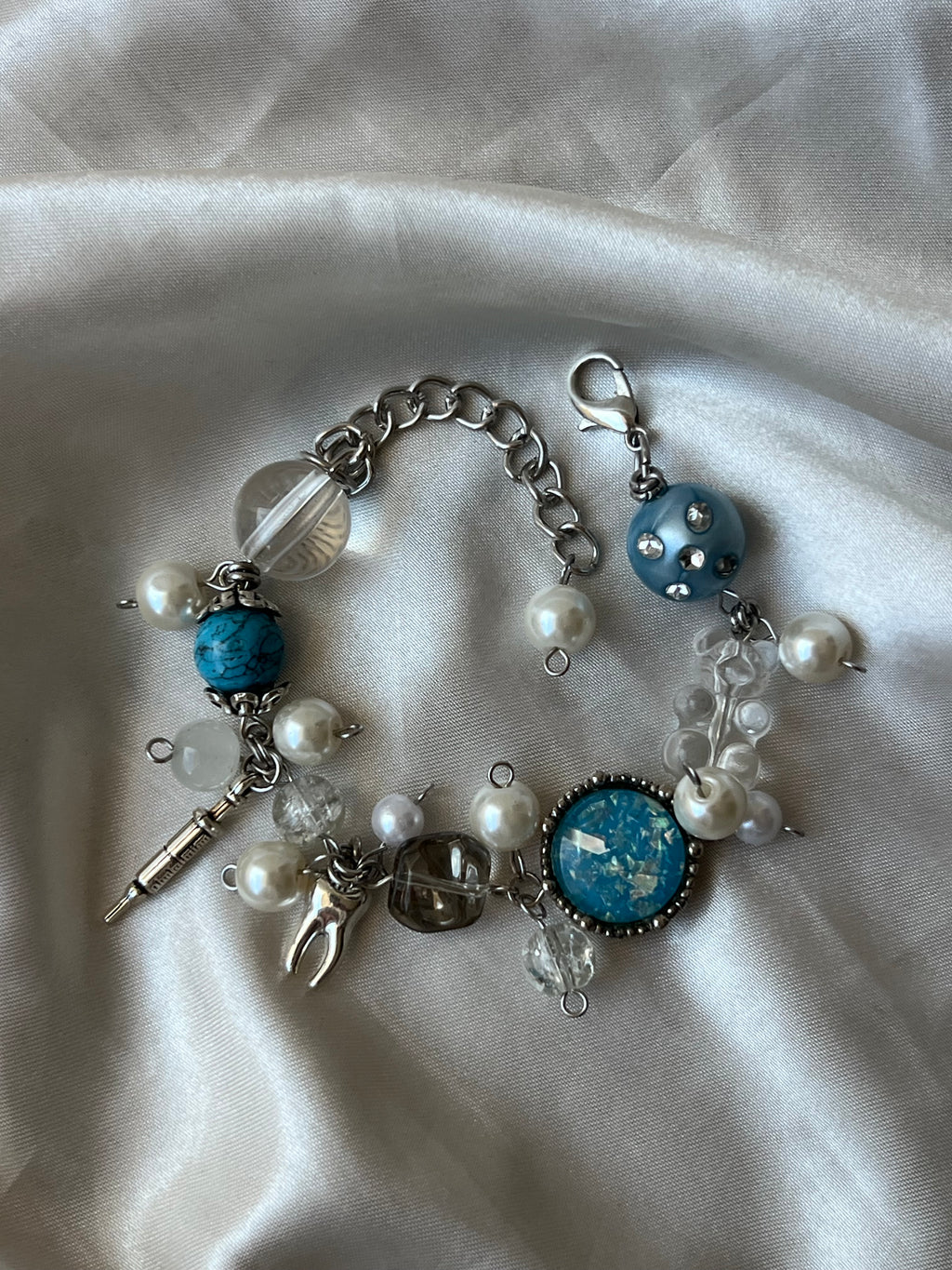 “Ghostly whispers” bracelet 🧸🕯️🧷⋆.ೃ࿔*:･