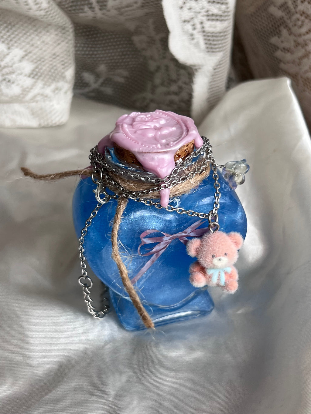 Jewelry display potion with teddy necklace