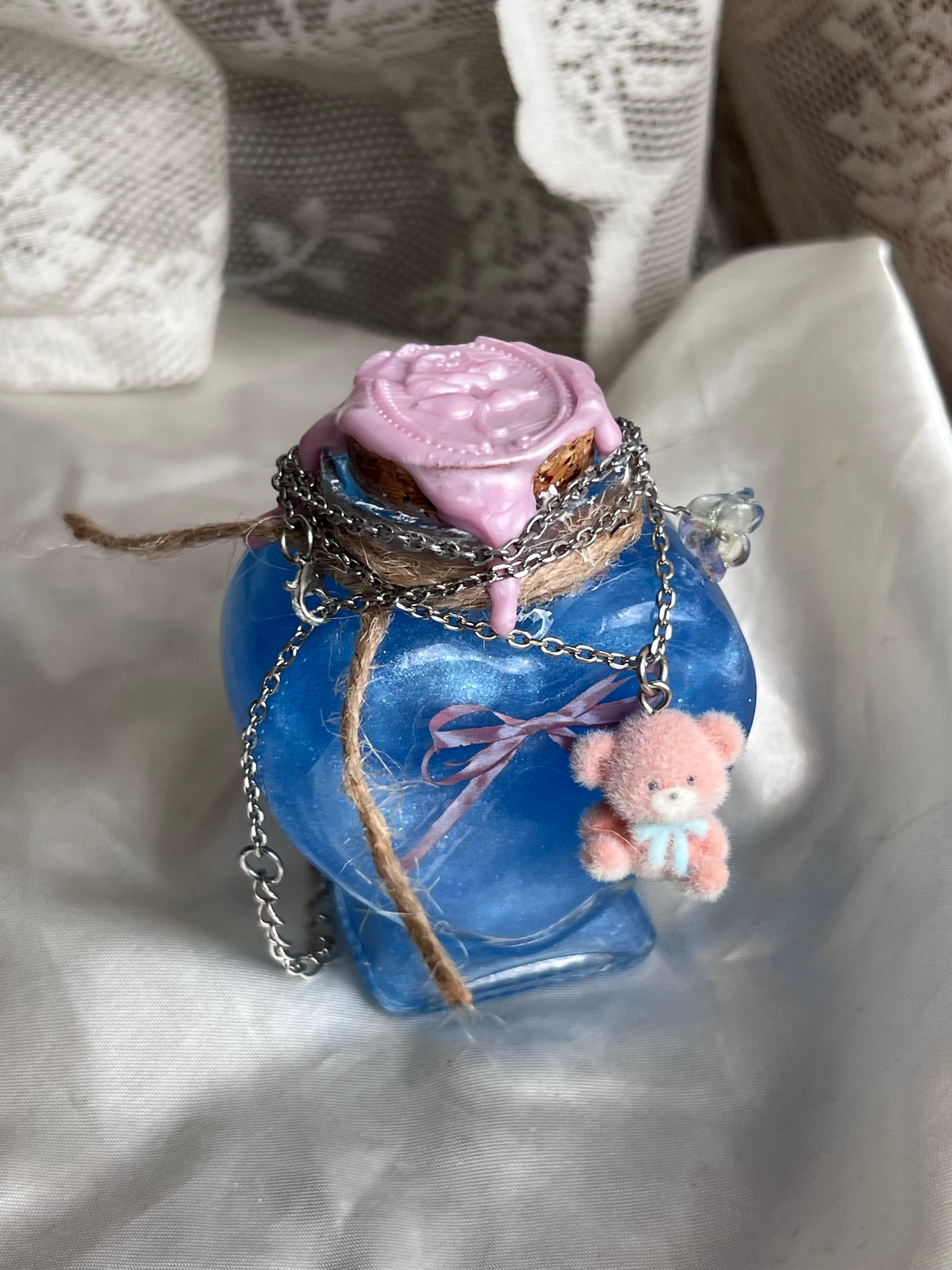 Jewelry display potion with teddy necklace