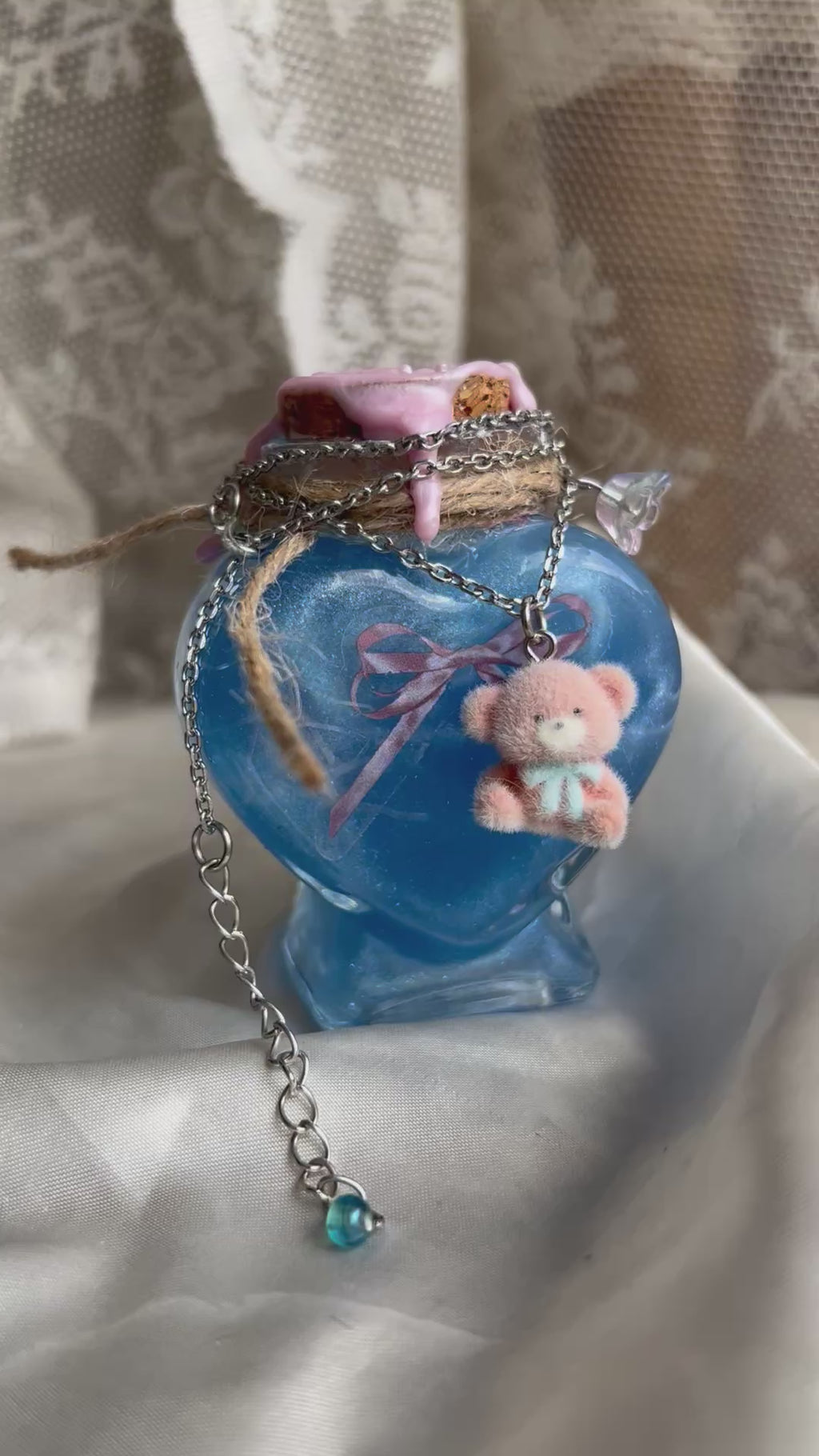 Jewelry display potion with teddy necklace