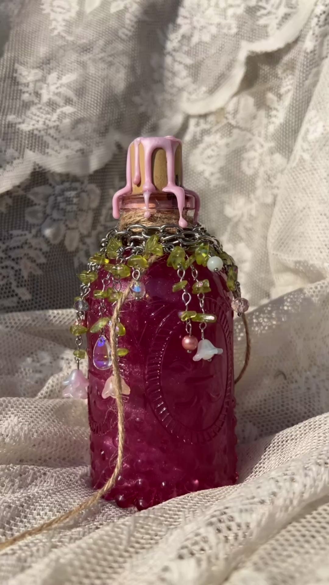Potion display with lush forest necklace