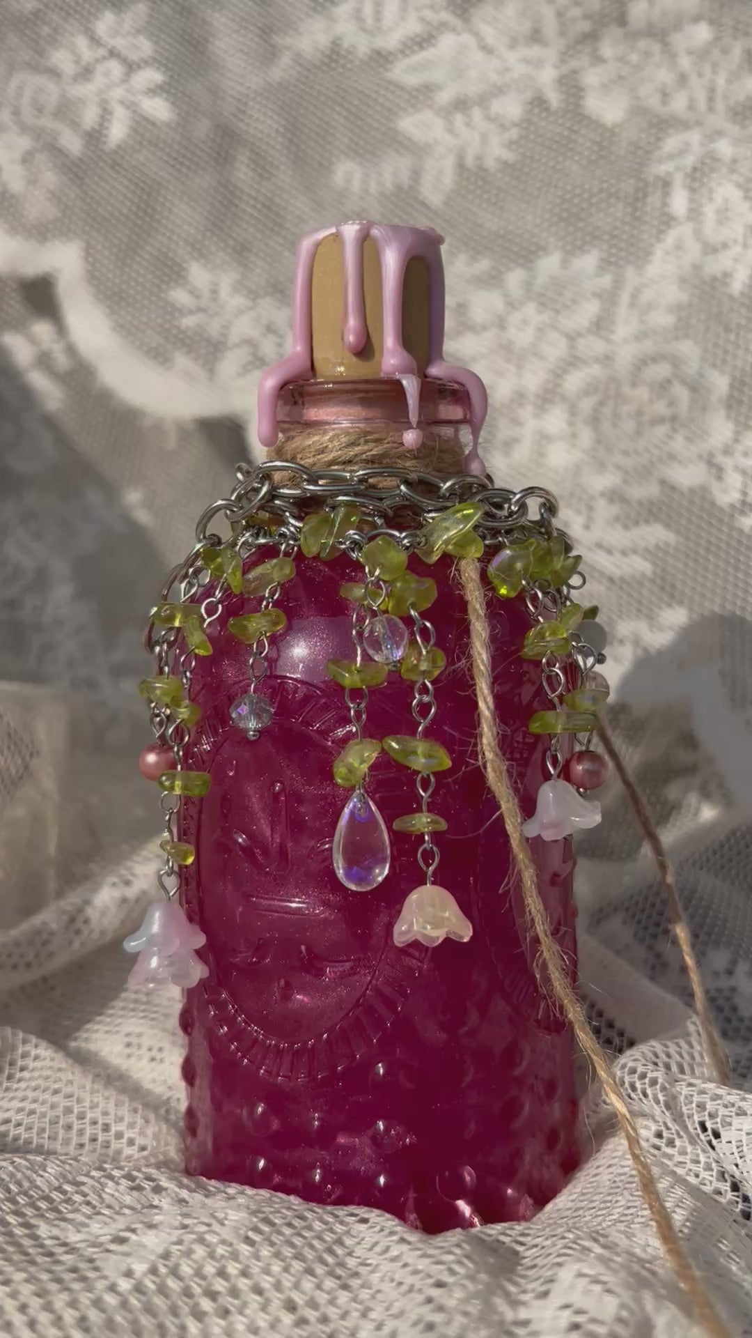 Potion display with lush forest necklace